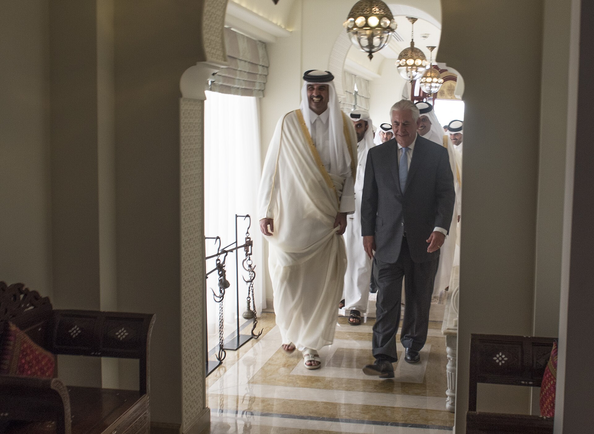 US Secretary of State Rex Tillerson walks with Qatar Emir Tamim bin Hamad Al Thani in Doha, July 2017 — Tillerson visited during the Saudi-led blockade of Qatar which ended January 5, 2021 with the Al-Ula Declaration