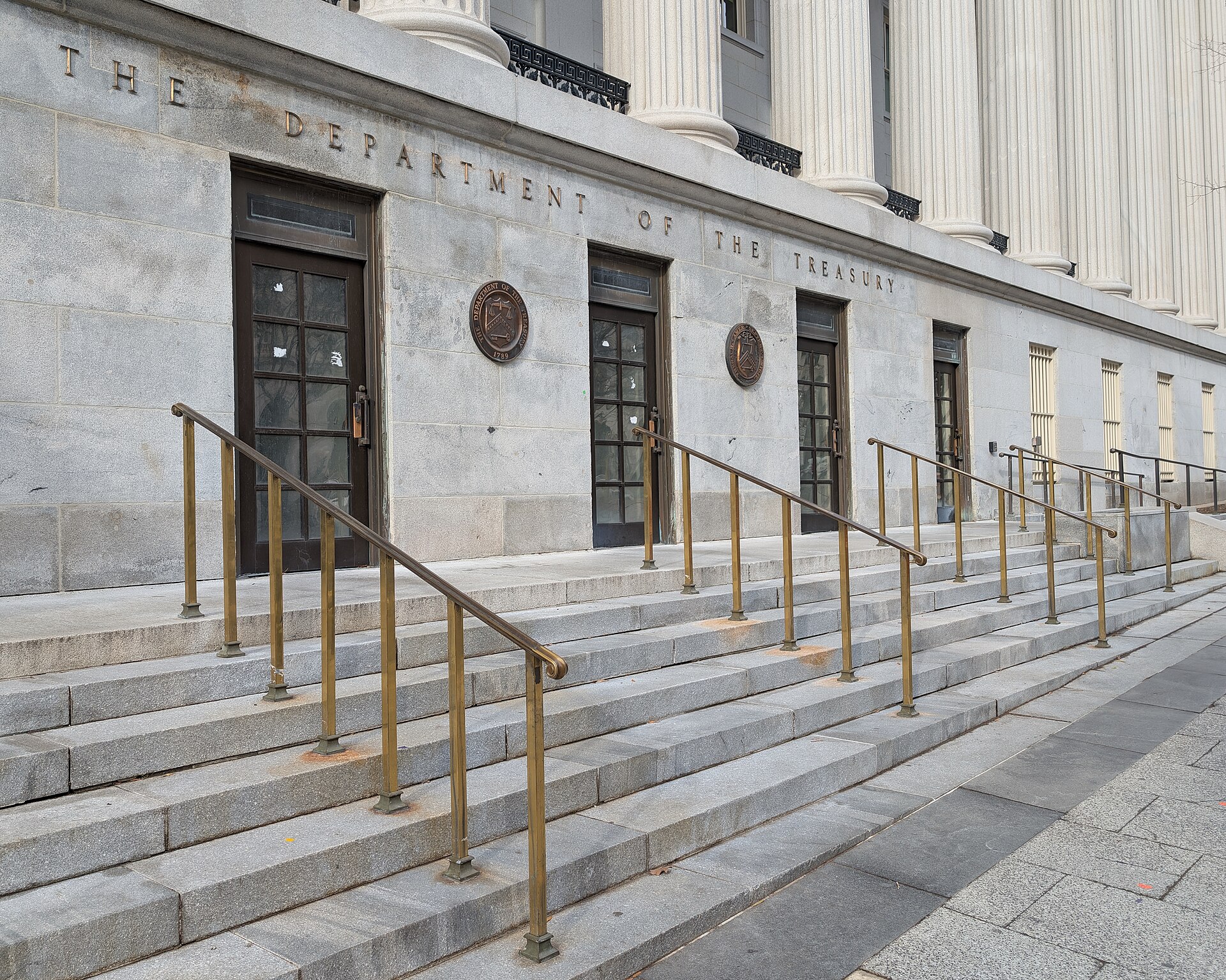 US Department of the Treasury entrance sign Washington DC — Bessent's June 6 directive invokes IEEPA armed-hostilities authority