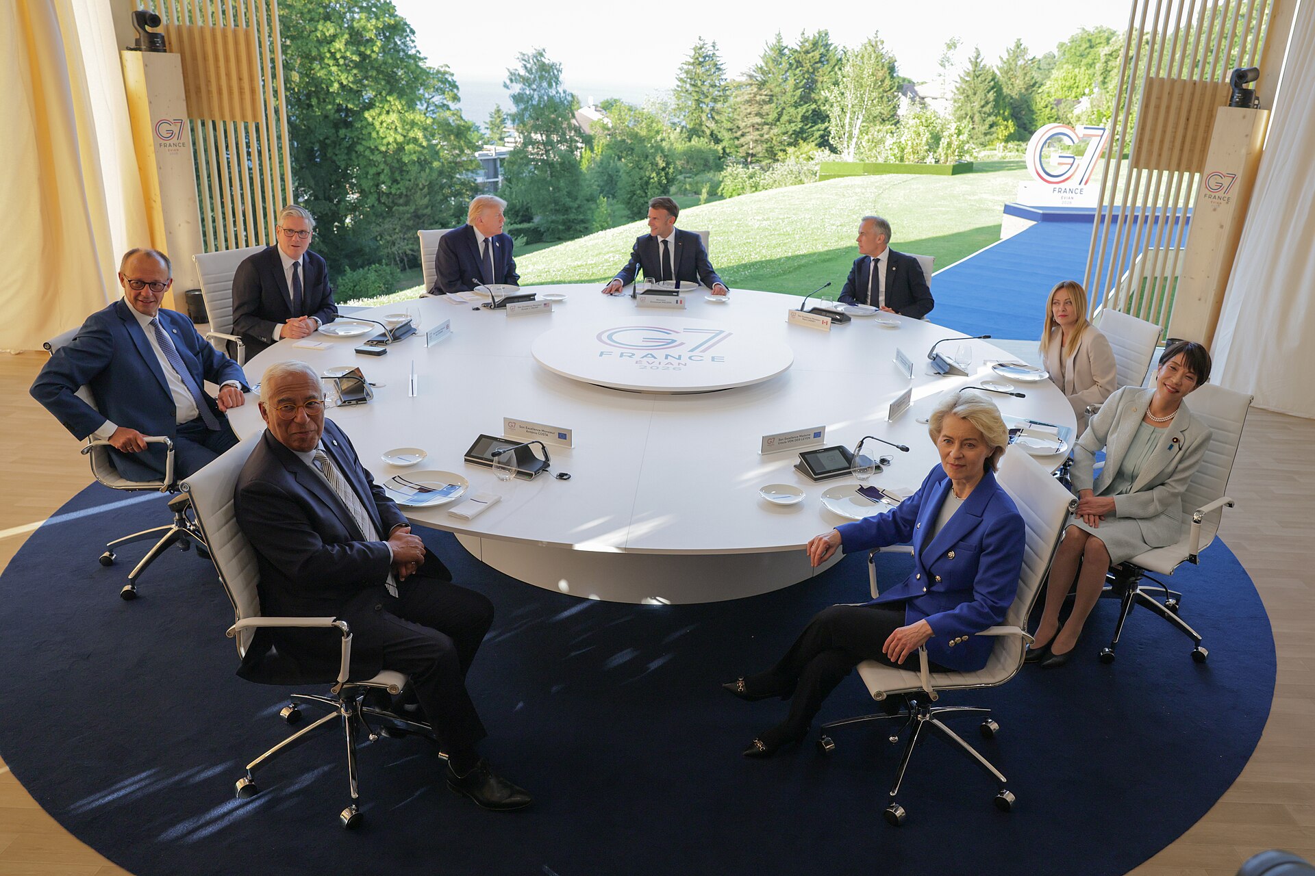 G7 leaders including Donald Trump and Emmanuel Macron seated at the round summit table at the 52nd G7 in Évian, France, June 2026