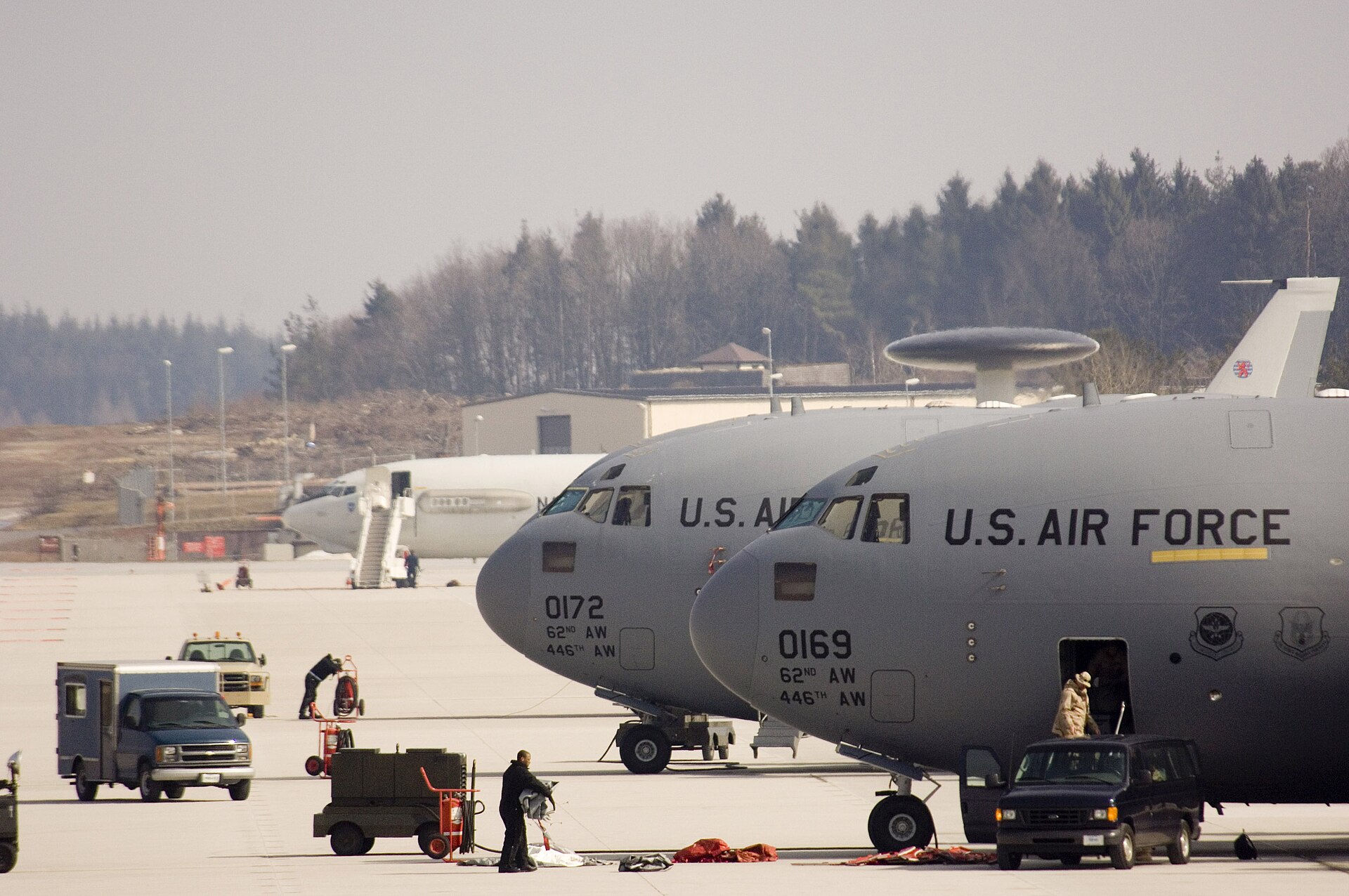 Two US Air Force C-17 Globemaster III transport aircraft on tarmac — the C-17 is the primary USAF strategic airlift platform used for vice-presidential overseas deployments