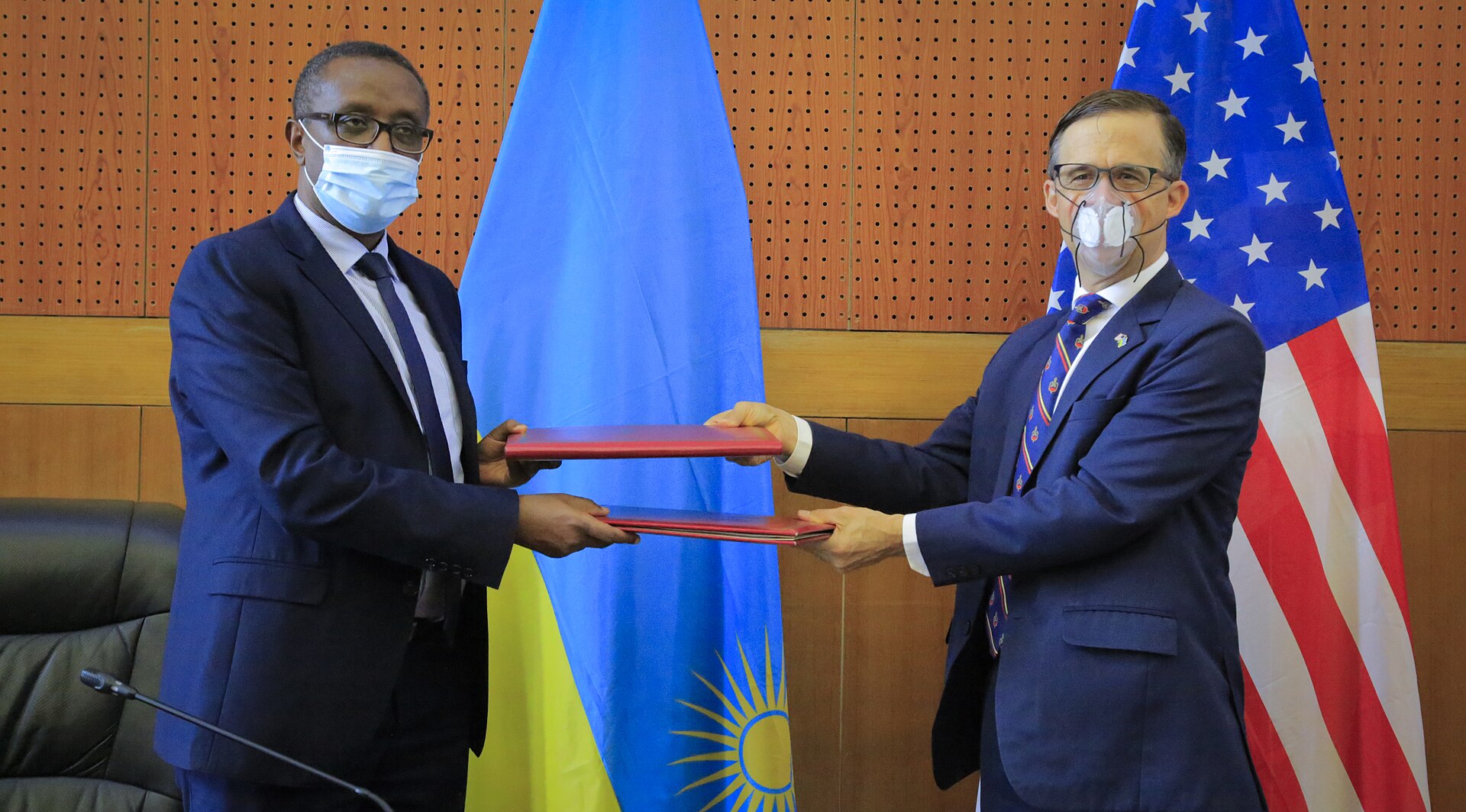 US and Rwanda officials exchange signed Status of Forces Agreement documents — the type of bilateral legal instrument Saudi Arabia has never concluded with the United States