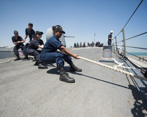 USS Arleigh Burke DDG-51 mooring at Naval Support Activity Bahrain pier, US Fifth Fleet headquarters in Juffair, Manama