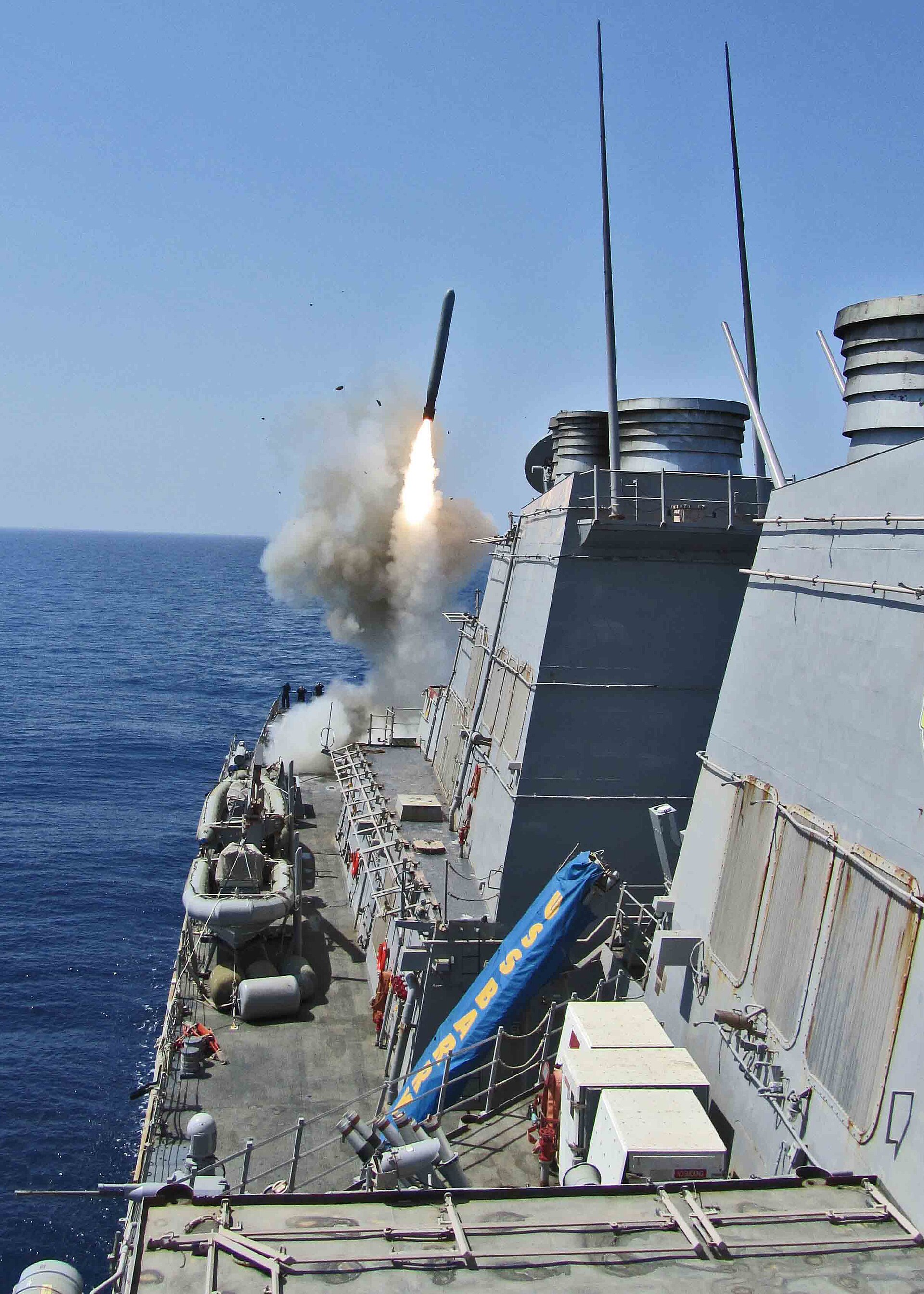 USS Barry guided-missile destroyer launches a Tomahawk cruise missile in the Mediterranean Sea during Operation Odyssey Dawn, March 2011
