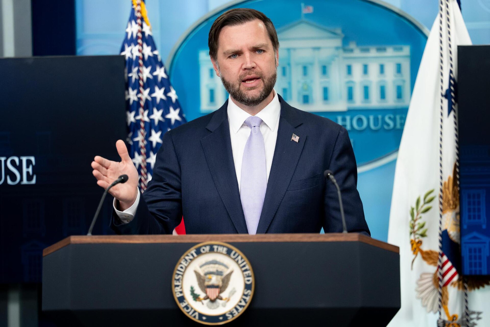 Vice President JD Vance speaks at White House press briefing podium with VP seal