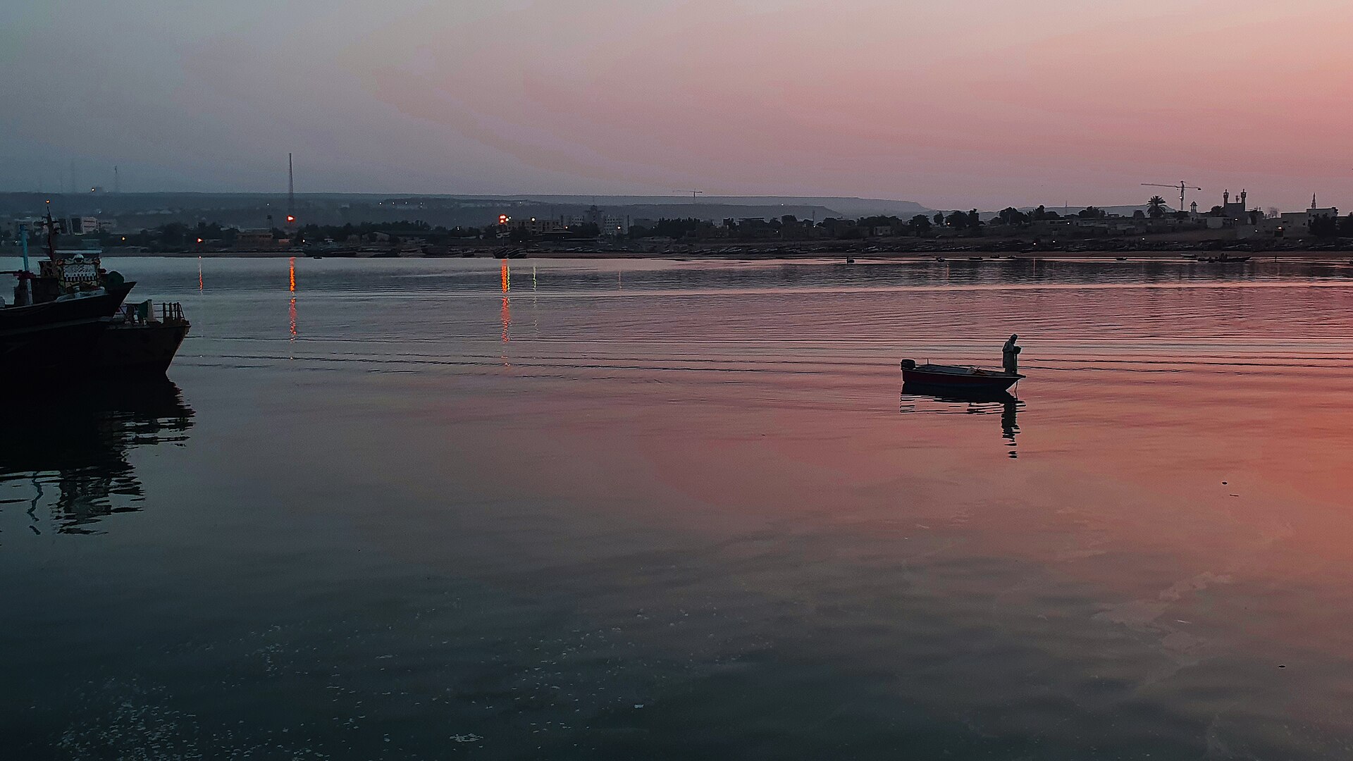 Chabahar harbor at dusk, Sistan-Baluchestan province, Iran — the port India developed as its alternative maritime corridor bypassing the Strait of Hormuz
