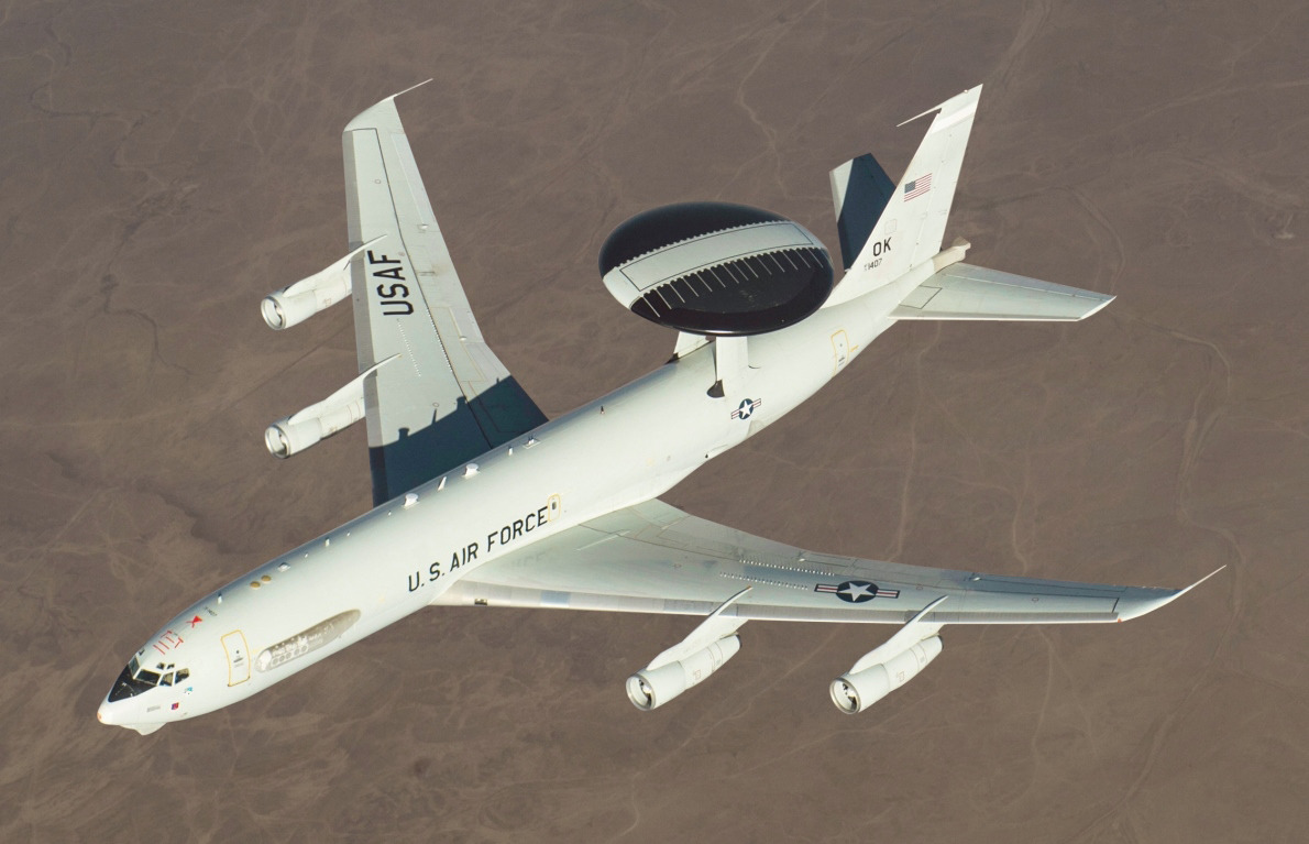 A US Air Force E-3 Sentry AWACS aircraft conducts a surveillance mission — one of sixteen in the Air Force fleet, each valued between $270 million and $500 million and irreplaceable under current production