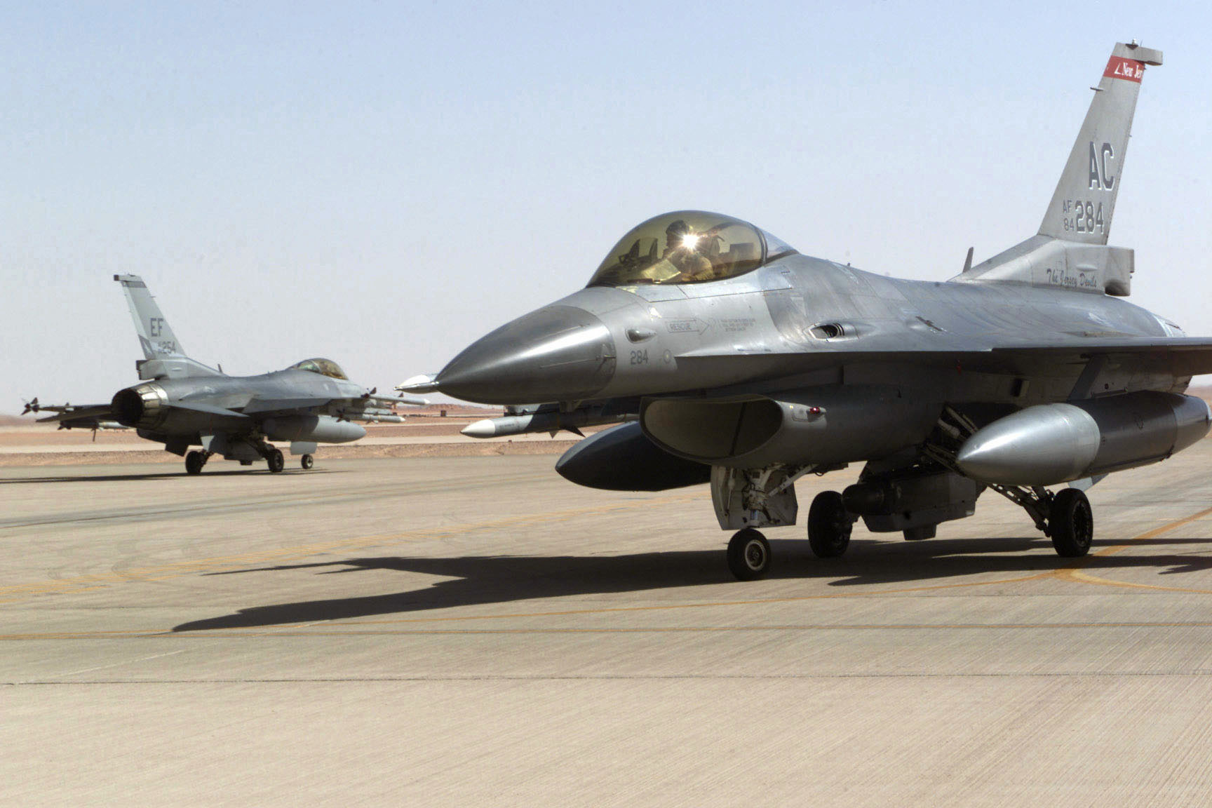 F-16 Fighting Falcons from the New Jersey Air National Guard taxiing at Prince Sultan Air Base, Saudi Arabia, during Operation Southern Watch