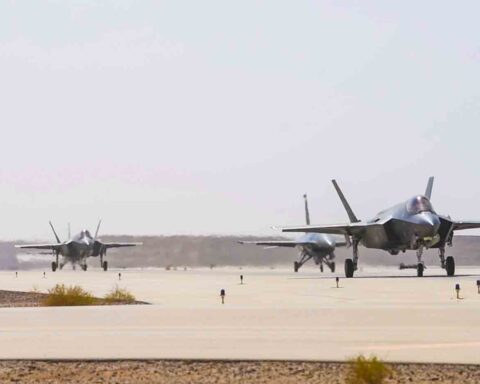 F-35A and F-16C jets taxi on the runway at Prince Sultan Air Base, Saudi Arabia, February 2020