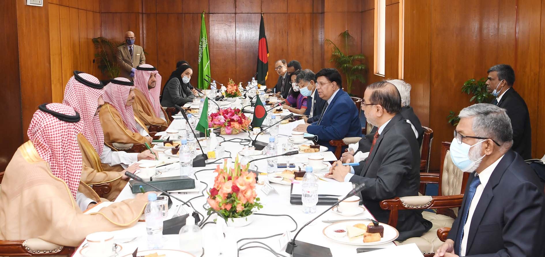 Saudi Foreign Minister Faisal bin Farhan Al Saud at a formal bilateral meeting with Bangladesh Foreign Minister Abdul Momen, Dhaka, March 2022 — Faisal serves as Riyadh's lead at the China-Saudi-Iran trilateral committee