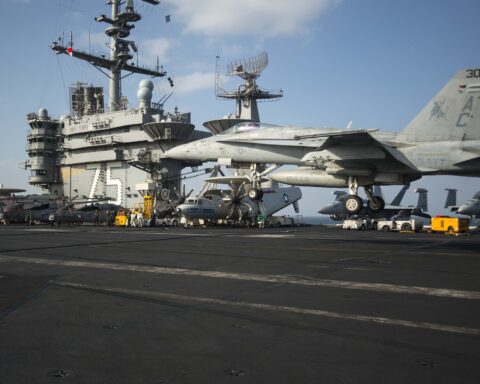 F/A-18C Hornet on the flight deck of USS Harry S. Truman CVN-75 in the Persian Gulf, January 2014