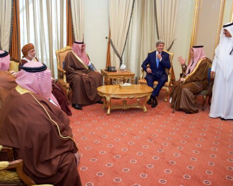 GCC foreign ministers seated at a round-table meeting in Saudi Arabia — Secretary Kerry and FM Saud al-Faisal of Saudi Arabia with Gulf counterparts, March 2015, illustrating the diplomatic format Riyadh seeks to revive for Gulf-Iran reconciliation