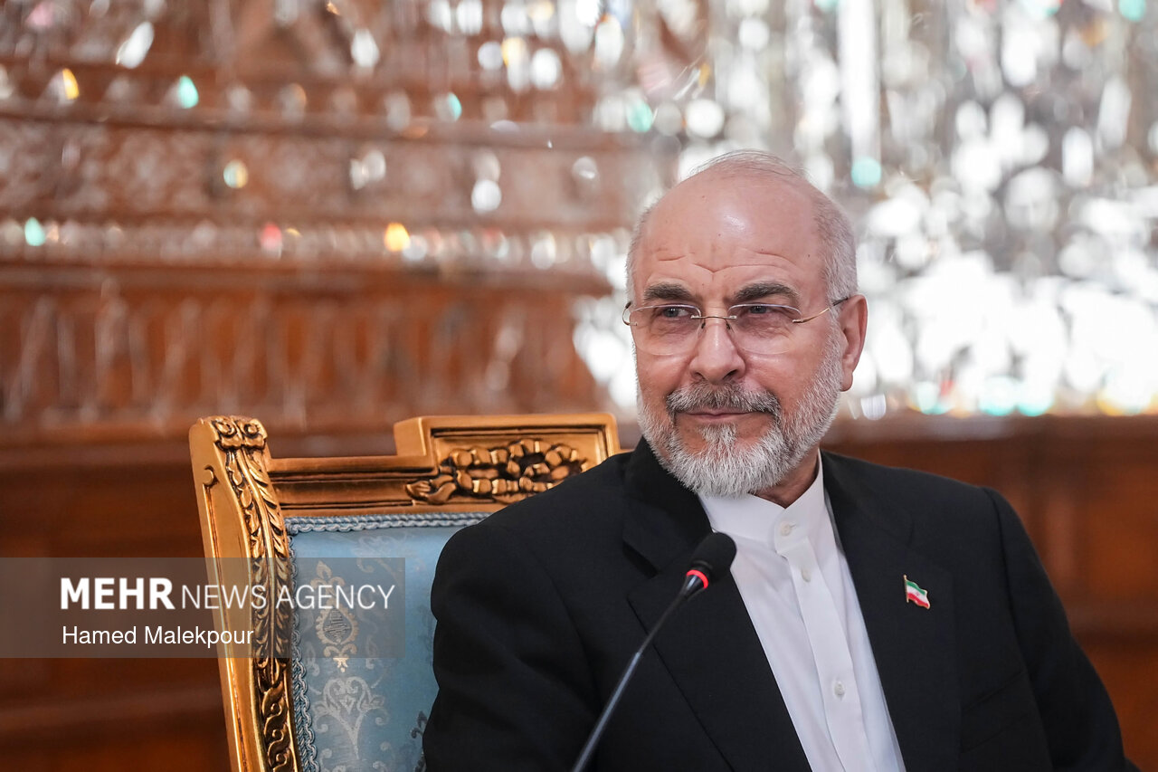 Mohammad Bagher Ghalibaf at a bilateral meeting with Pakistani Army Chief Asim Munir, Tehran 2026, with an Iranian flag pin on his lapel