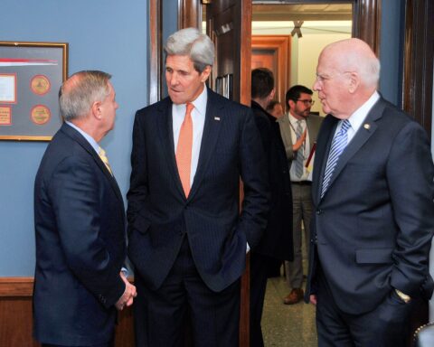 Senator Lindsey Graham and Secretary of State John Kerry in conversation on Capitol Hill before Senate Appropriations Committee testimony on foreign operations, February 2015