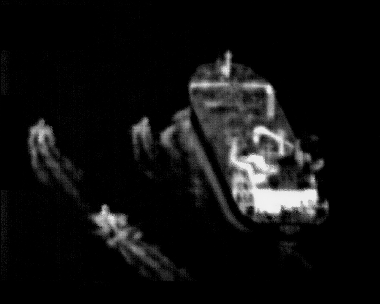 Three IRGC fast-attack craft approach an internationally flagged merchant vessel transiting the Strait of Hormuz, June 2023, in US Navy P-8A Poseidon surveillance footage