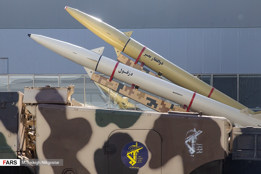 IRGC Zolfaghar Basir and Dezful ballistic missiles on road-mobile TEL with IRGC emblem visible — the weapons system using BeiDou military navigation to defeat US GPS jamming