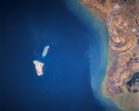 Kharg Island satellite view from NASA, showing Iran's primary oil export terminal and loading jetties in the Persian Gulf