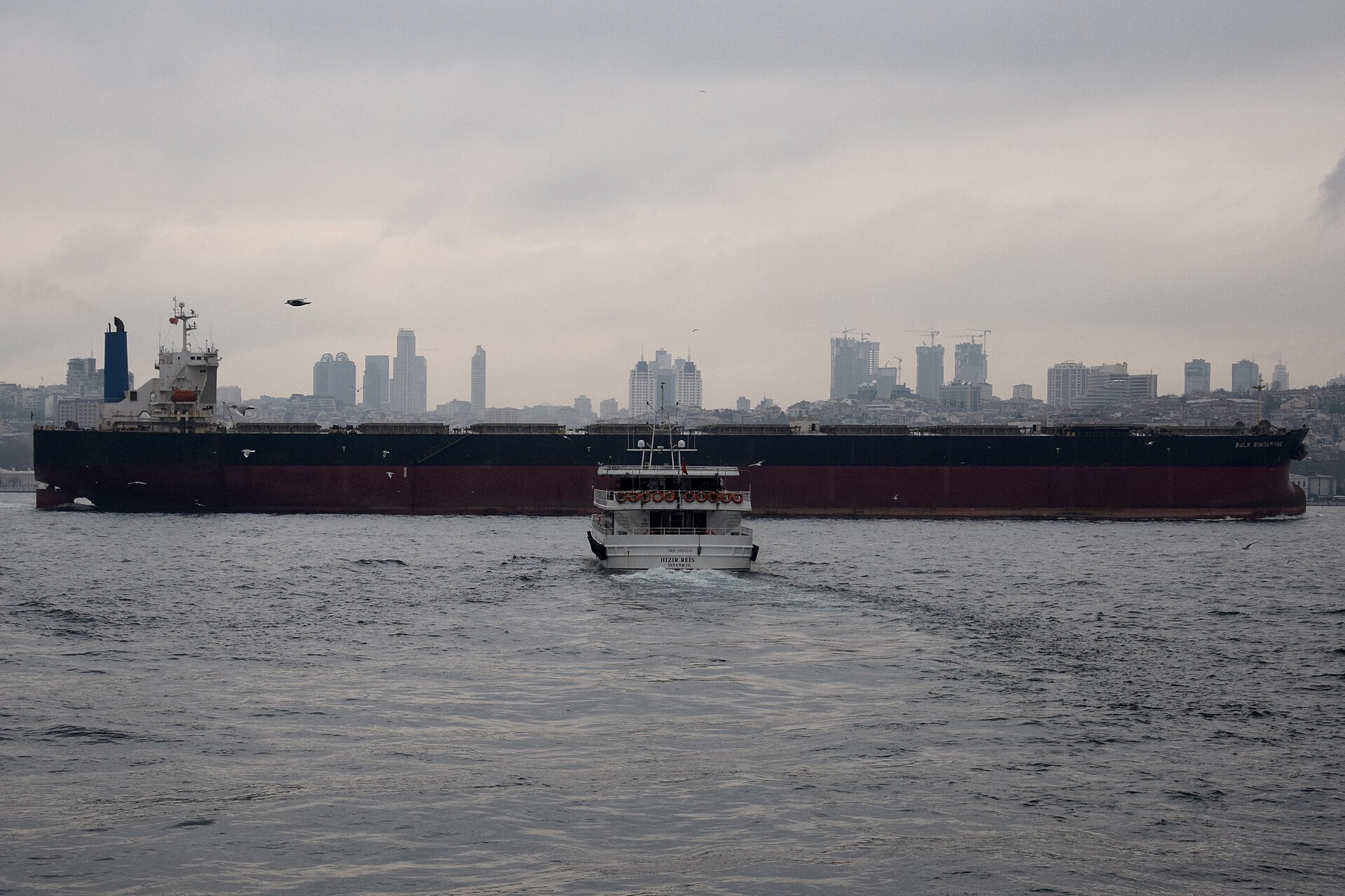 Liberian-flagged bulk carrier similar to Magic Seas and Eternity C transiting a strait — both ships sunk by Houthi forces in the Red Sea in July 2026 were Liberian-registered and Greek-owned