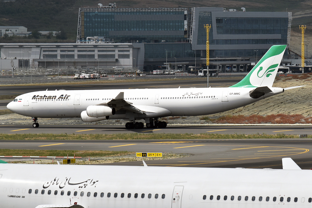 Mahan Air Airbus A340-313 registration EP-MMC taxiing at an Iranian airport. This aircraft operated flight IRM1199 from Tehran toward Sanaa on July 13, 2026.