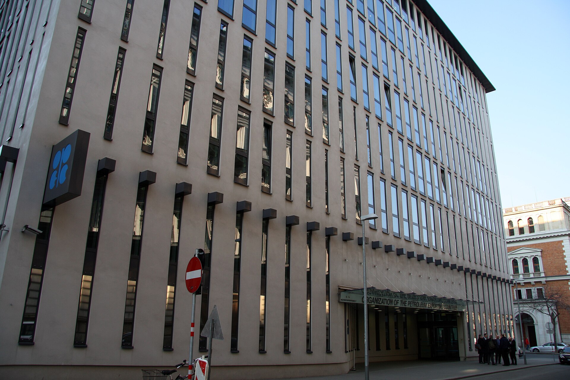 OPEC headquarters building in Vienna, Austria, with the organization's logo and entrance signage visible