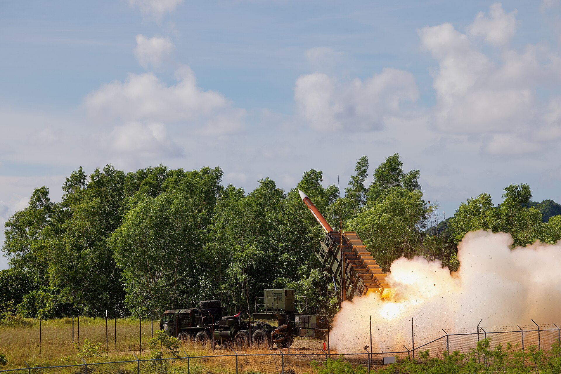A Patriot Advanced Capability-2 interceptor missile is fired from an M903 Patriot Launching Station during Exercise Tenacious Archer 25 in August 2025 — the same PAC-2 and PAC-3 systems defending US bases across the Gulf theater