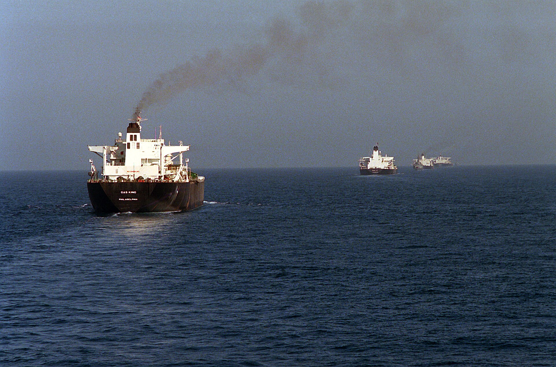 Reflagged Kuwaiti oil tankers Gas King, Ocean City, Sea Isle City, and Bridgeton transit the Persian Gulf under US Navy escort during Operation Earnest Will, 1987. US Navy / Public Domain.