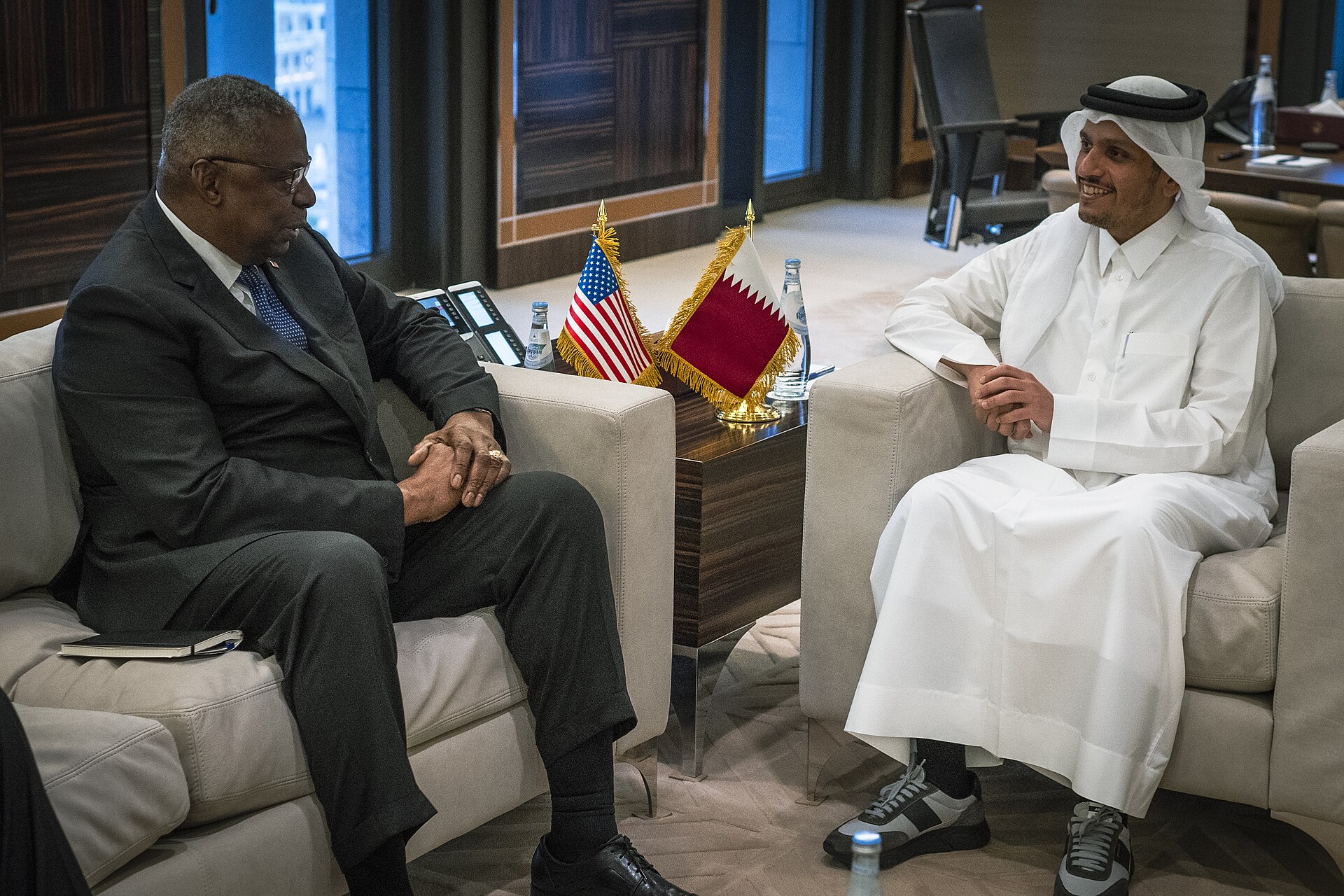 US Secretary of Defense Lloyd Austin meets Qatari Prime Minister Mohammed bin Abdulrahman Al Thani in Doha in December 2023 — Qatar is now the primary US-Iran ceasefire interlocutor, hosting the Doha track while Saudi Arabia holds no seat at any of the three active mediation tables