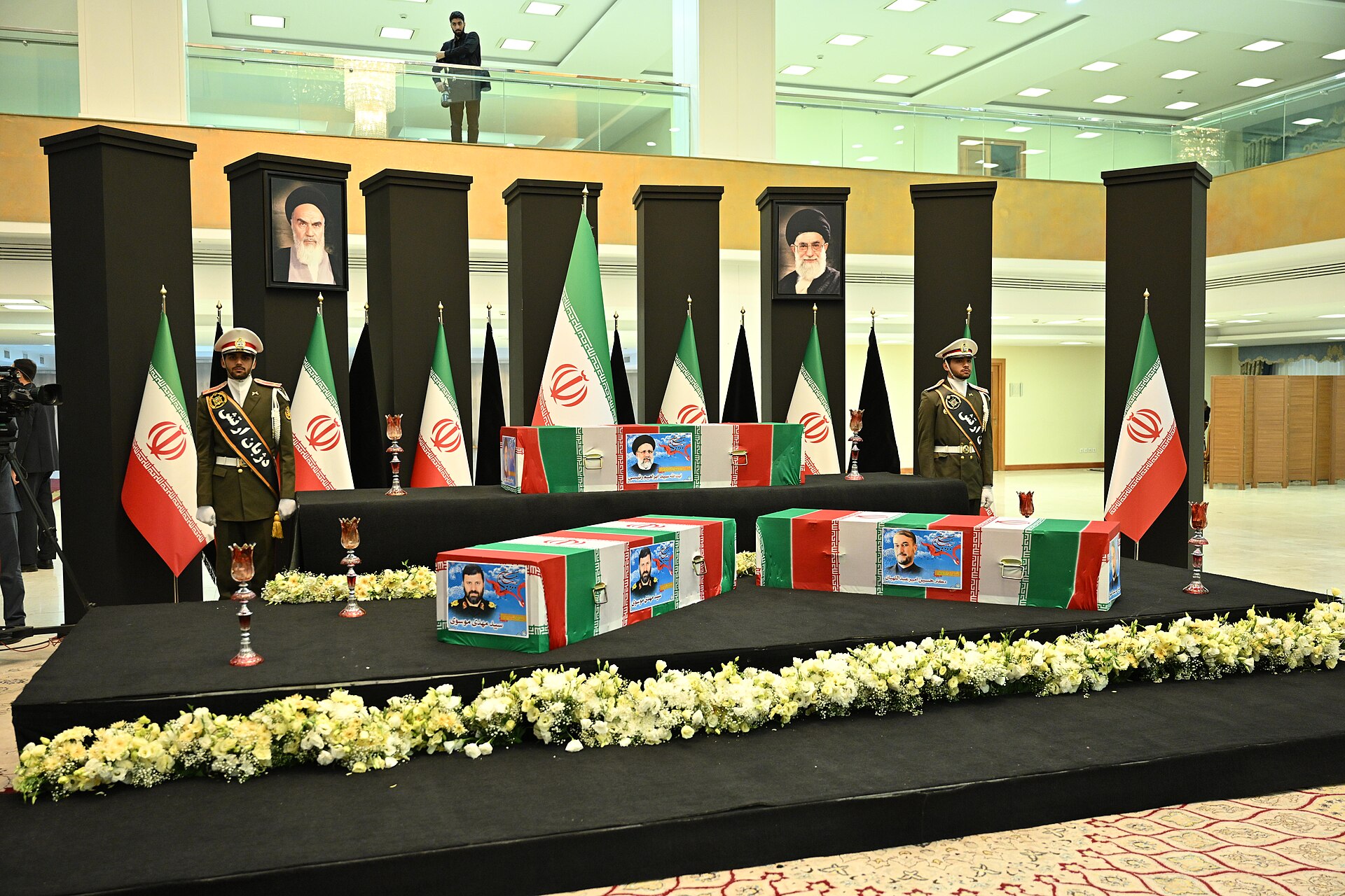 Farewell ceremony for Iranian President Ebrahim Raisi, Tehran, May 2024, with Khomeini and Khamenei portraits displayed