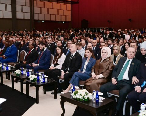 Antalya Diplomacy Forum 2026 opening ceremony plenary hall with Erdogan and foreign delegates seated