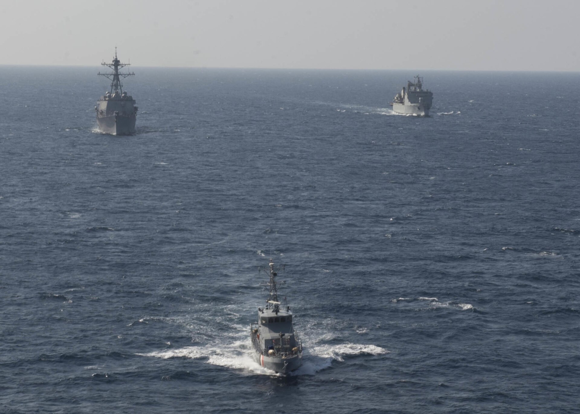 USS Dewey guided-missile destroyer and Royal Saudi tanker Yunbou transiting the Red Sea during joint naval exercises, November 2014