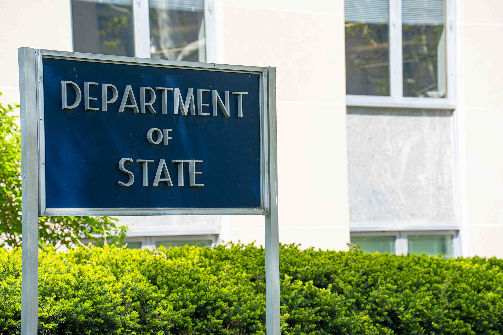 US Department of State Harry S. Truman Building exterior sign Washington DC — origin of the DSCA Foreign Military Sale notification approving $1.96 billion in APKWS-II guidance kits to Saudi Arabia