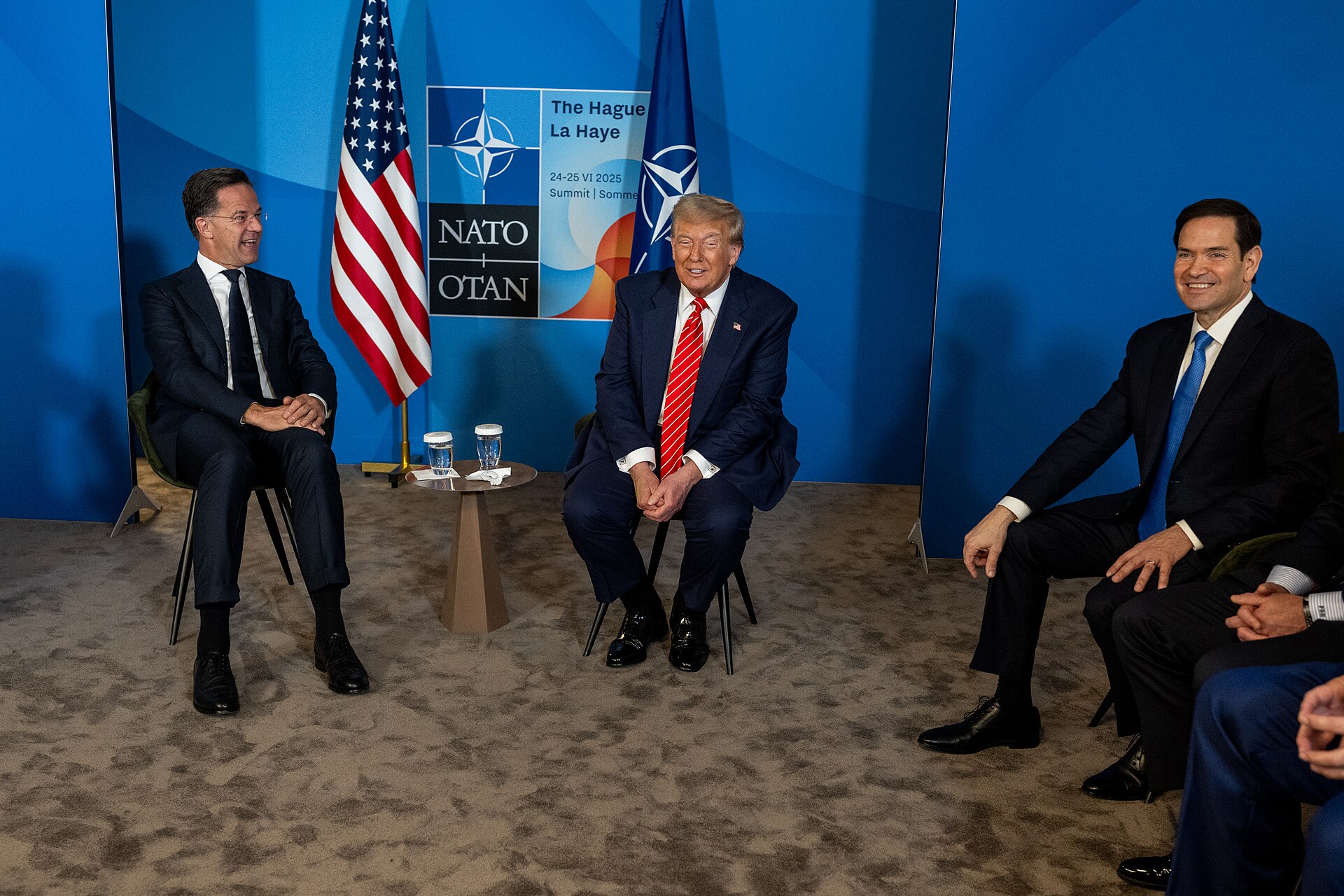 President Trump, NATO Secretary General Mark Rutte, and Secretary of State Rubio at the 2025 NATO Summit in The Hague — Trump demanded loyalty from allies and threatened troop withdrawals, applying the same cost-extraction logic to Saudi Arabia as to European partners