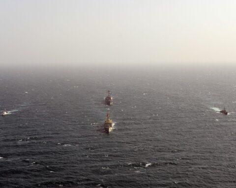 US Navy guided-missile destroyer USS William P. Lawrence and Royal Bahrain Naval Forces frigate Sabah transit the Arabian Gulf during Exercise Neon Falcon, March 2013