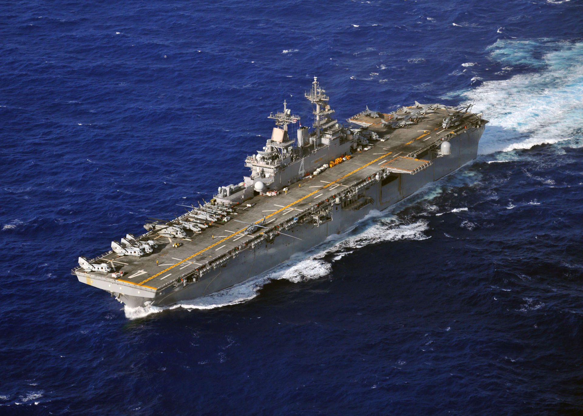 USS Boxer (LHD-4) underway as flagship of the Boxer Amphibious Ready Group — the ship from whose deck US Marines from the 11th MEU conducted the helicopter-insert boarding of M/T Wen Yao on July 16, the first confirmed vessel boarding under the US naval blockade reinstated July 14. Photo: US Navy / Public Domain