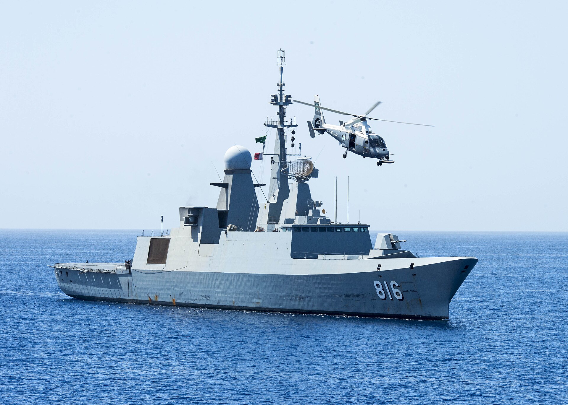 Royal Saudi Navy frigate Al Dammam (816) with embarked AS565 Dauphin helicopter during exercise Eager Lion 2014