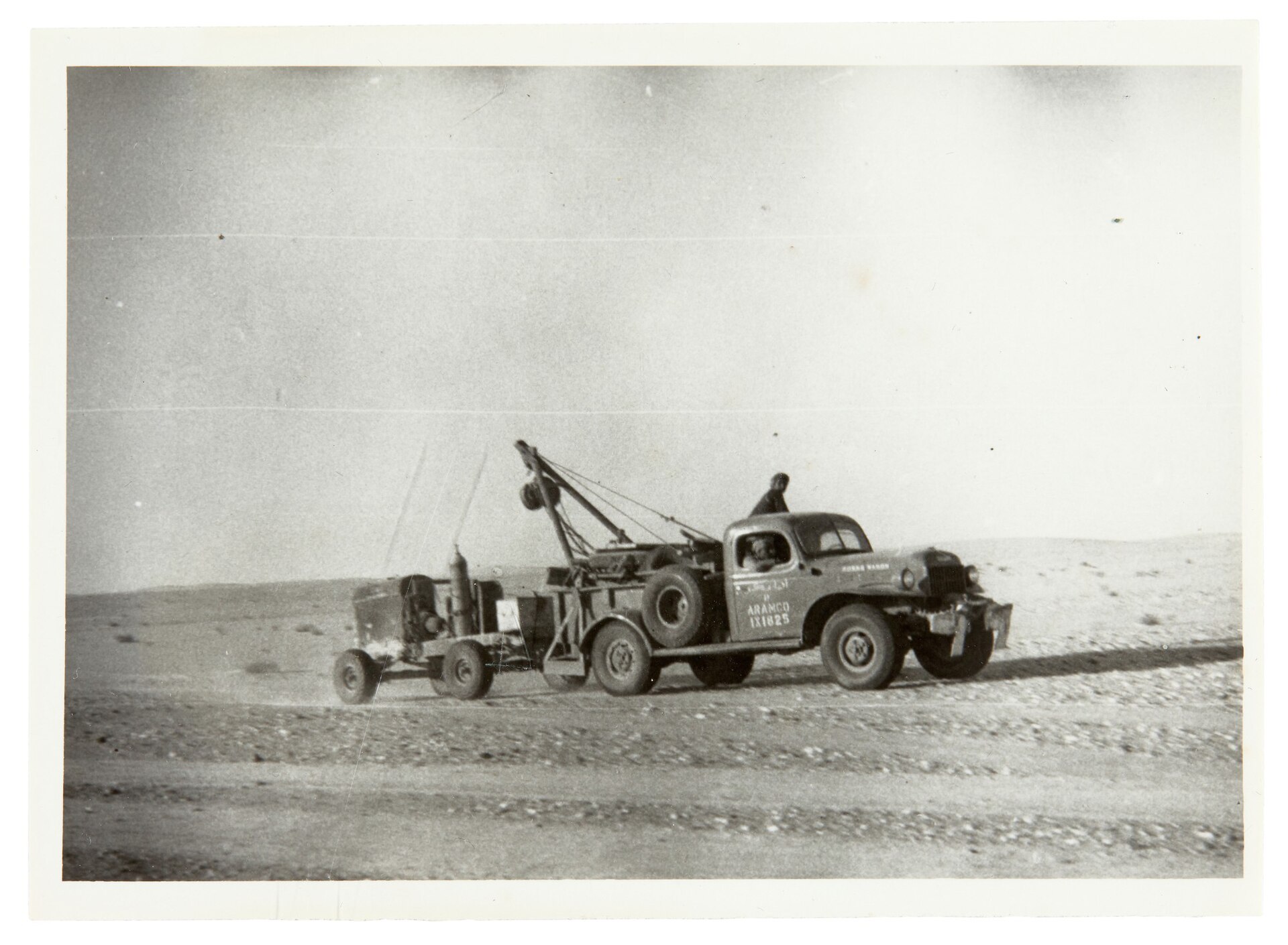 Saudi Aramco tow truck in the Arabian desert during field operations, 1951