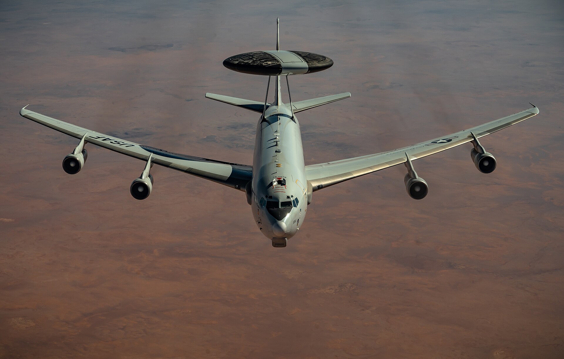 A US Air Force E-3 Sentry AWACS surveillance aircraft in flight over the Middle East. An E-3 Sentry of the same type was severely damaged in Iran's March 2026 strike on Prince Sultan Air Base south of Riyadh. Photo: SSgt Trevor McBride / US Air Force / Public Domain