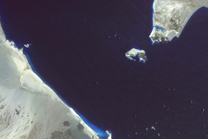 NASA ASTER satellite image of the Bab el-Mandeb strait showing Perim Island at the chokepoint between Yemen and Djibouti
