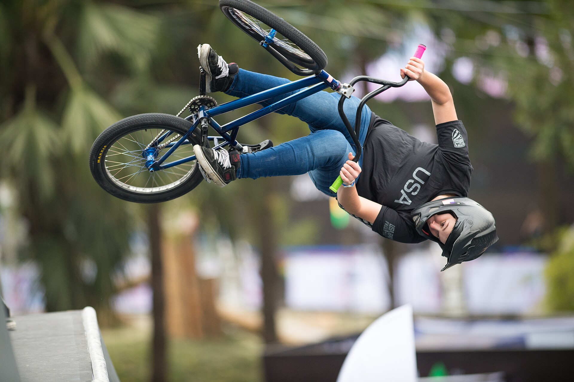 BMX freestyle park rider performing aerial trick at UCI Urban Cycling World Championships