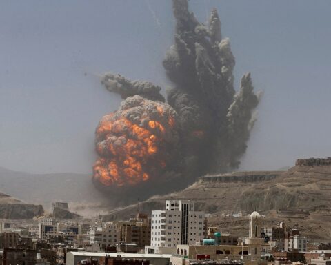 Smoke and fireball rise over Sanaa as a Saudi-led coalition airstrike hits an army weapons depot on Mount Attan, April 20, 2015