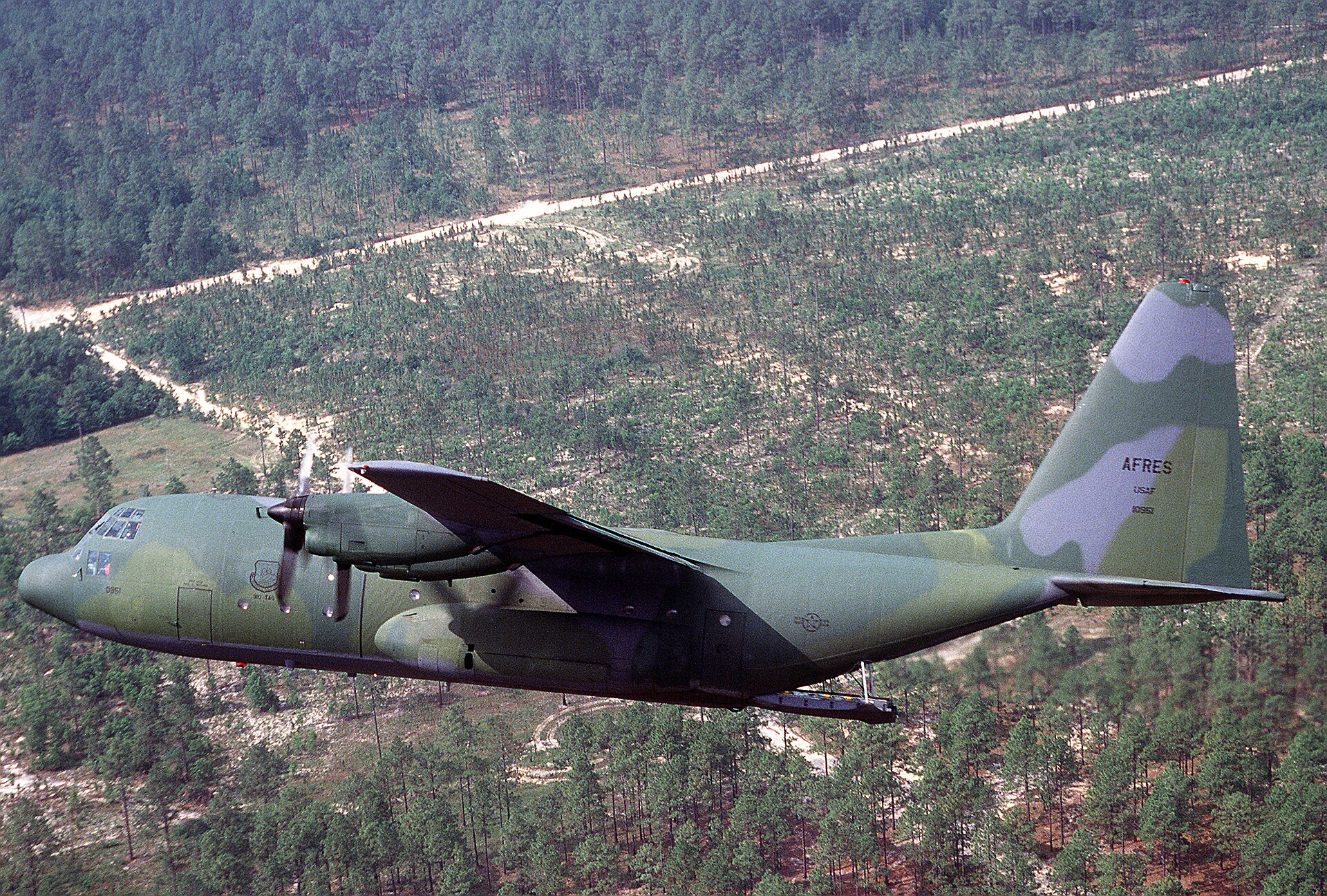 US Air Force Reserve C-130 Hercules military transport aircraft in flight