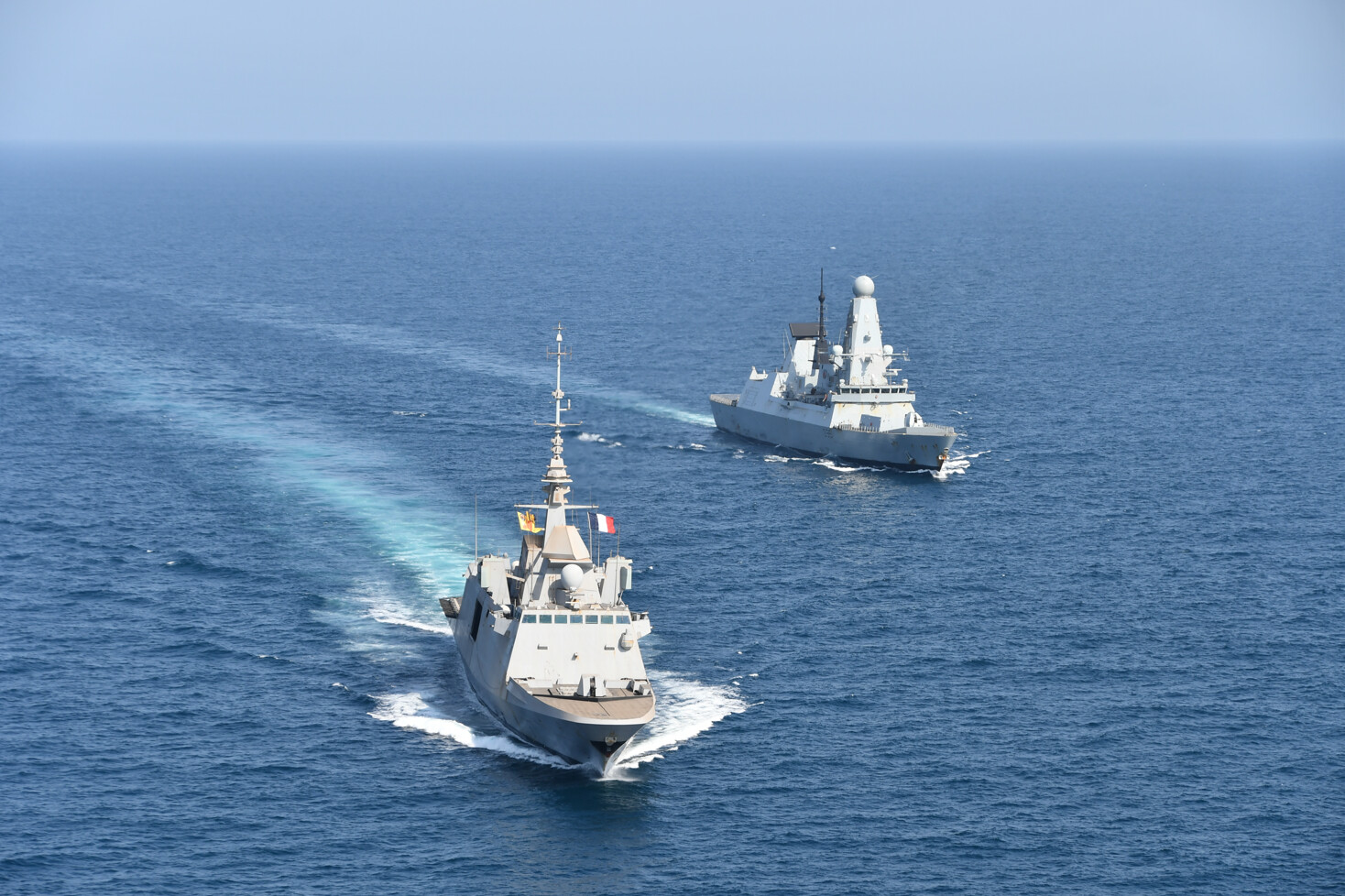 French FREMM frigate Provence and HMS Dragon (Type 45 destroyer) operating together in the Gulf, September 2026 — the UK-France coalition that agreed to disagree on how many ships were transiting the Strait