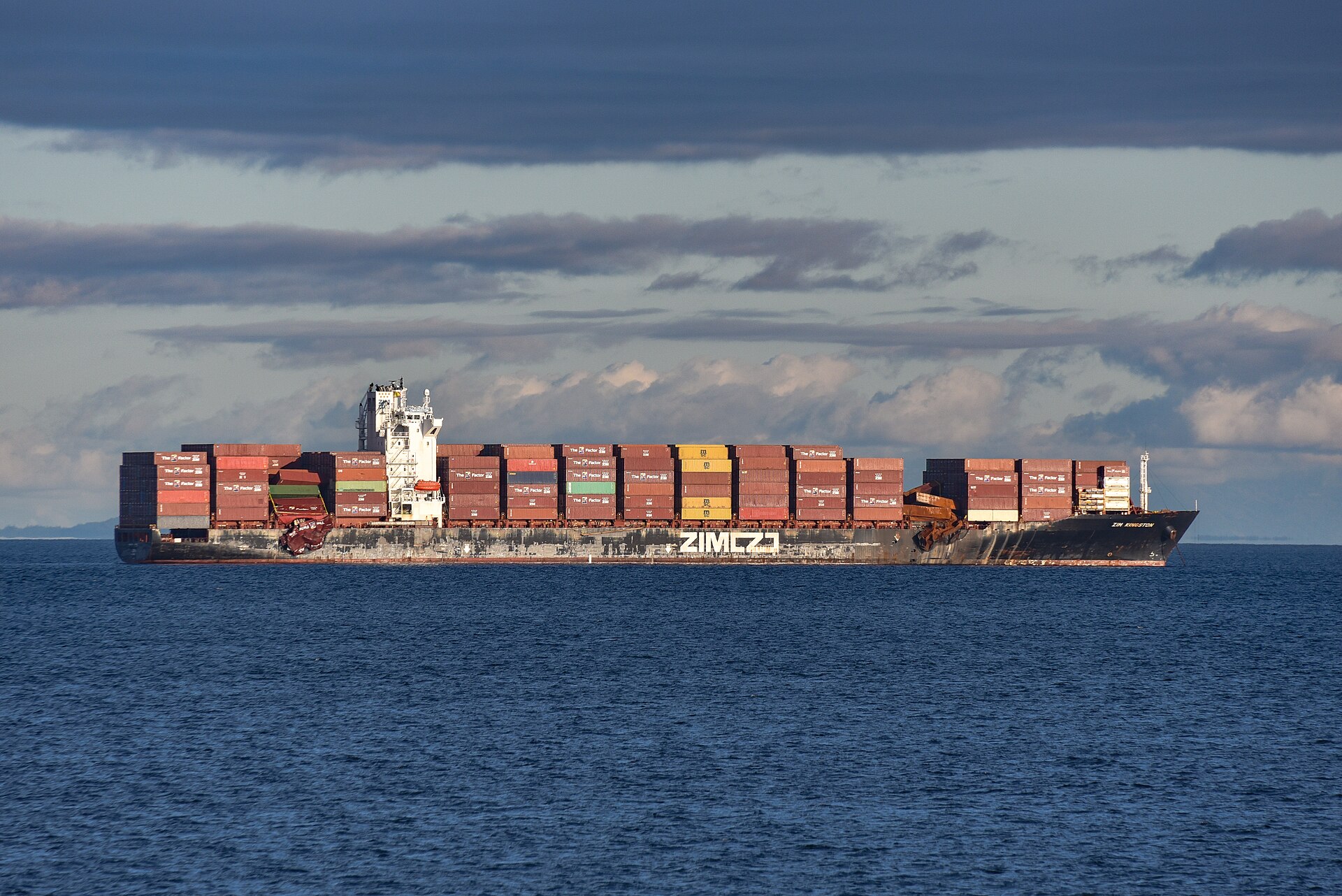 MV ZIM Kingston container ship at anchor showing hull damage after losing 109 containers in an on-board fire, off Victoria, British Columbia, November 2021