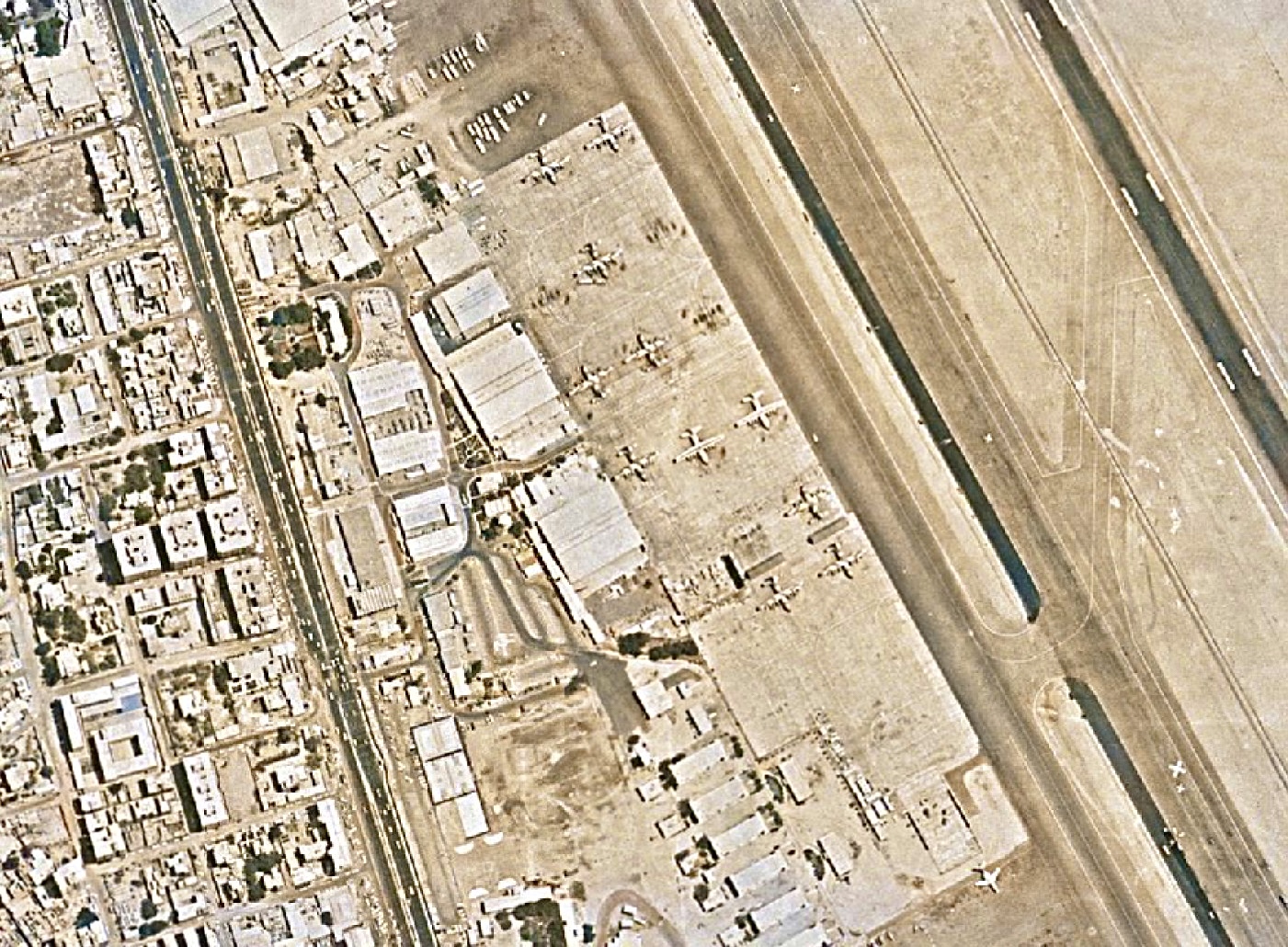 Aerial satellite view of Jeddah Air Base Saudi Arabia showing aircraft on tarmac and runway