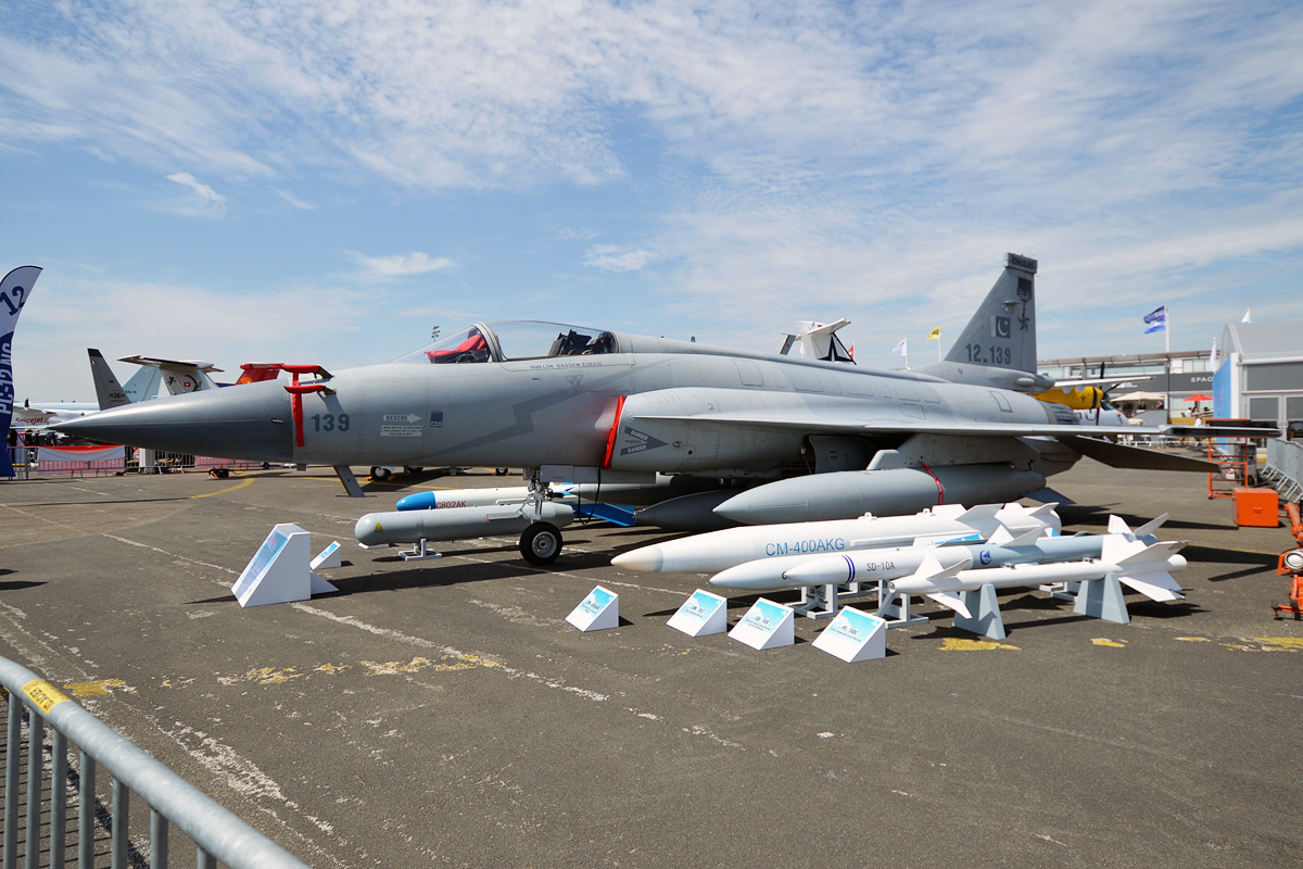 A Pakistan Air Force JF-17 Thunder multirole fighter at an airshow, displaying its armament — Pakistan had approximately sixteen JF-17s and 8,000 troops in Saudi Arabia as of May 2026 under a defence cooperation arrangement that predates the Mecca pact