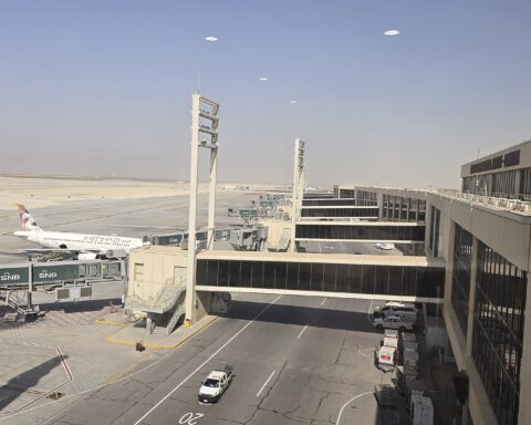 An Etihad Airways aircraft at a boarding gate at King Fahd International Airport, Dammam, Eastern Province of Saudi Arabia, February 2026