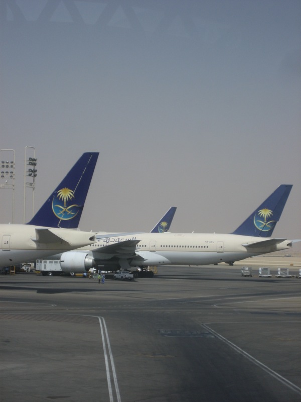 Saudi Arabian Airlines Boeing 777 aircraft on the apron at King Khalid International Airport in Riyadh, Saudi Arabia
