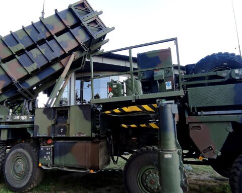 MIM-104 Patriot surface-to-air missile launcher with four interceptor missiles loaded. A Greek Patriot battery has been stationed near Yanbu since 2021 and has intercepted Houthi missiles and drones. Neither Turkey nor Pakistan has deployed an equivalent system under the Makkah pact.
