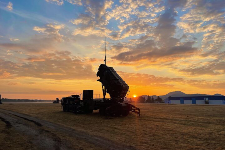 A US Army PAC-3 Patriot missile launcher deployed in operational configuration at sunrise, representing the air defence systems central to Saudi Arabia's ballistic missile defence