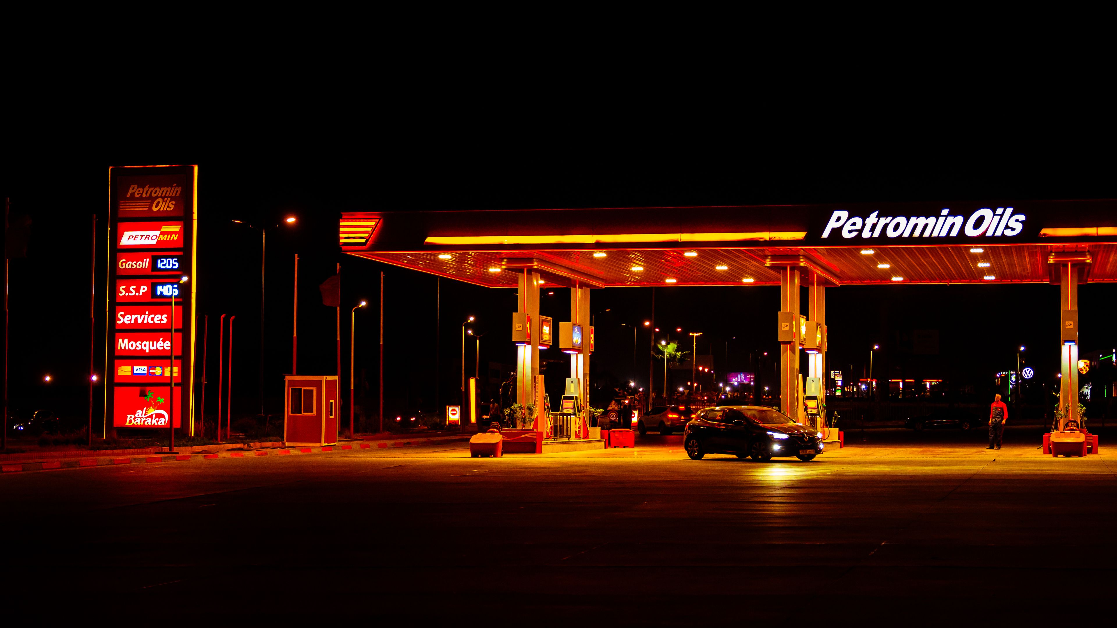 Petromin Oils fuel station in Marrakesh, Morocco at night — petrol station in North Africa
