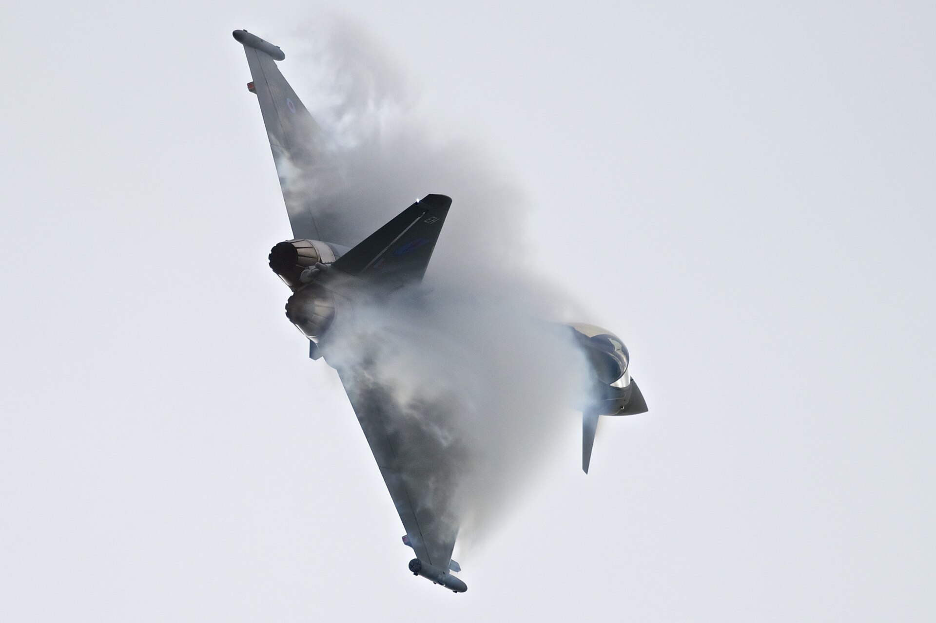 RAF Eurofighter Typhoon in high-speed maneuver with vapor condensation, Royal International Air Tattoo